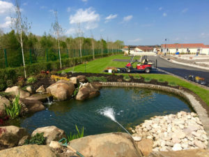 red deer village pond and water feature